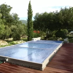 Cubierta extraplana para piscina modelo 8 de 12 x 6 motorizada